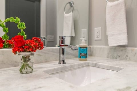 Bathtub, hair dryer, towels