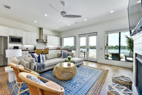 The living area opens to the kitchen and has beautiful views of the lake!