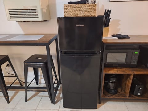 Fridge, microwave, coffee/tea maker, toaster