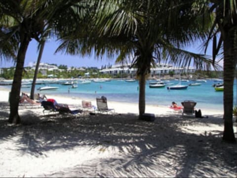 On the beach, sun loungers, beach towels