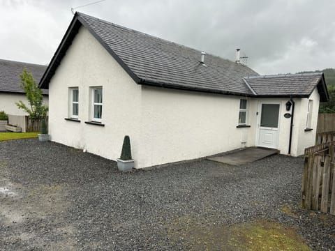 Front of the cottage, with parking facilities.