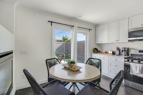 Bright & Cozy Dining Area seats 4 people.