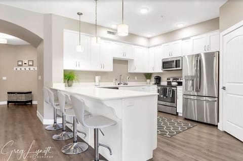 Bright and airy kitchen stocked with everything you need.