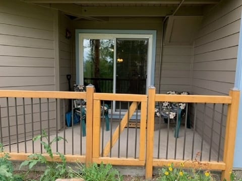 Patio opens to common area near tennis courts and playground.