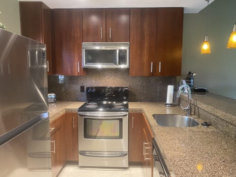 Cherrywood kitchen cabinets imported tile flooring throughout