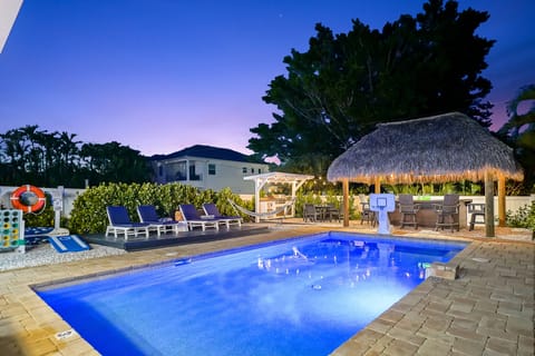 Outdoor pool, a heated pool, sun loungers