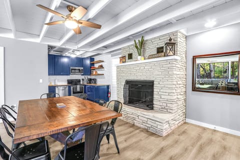 The kitchen is behind the dining area