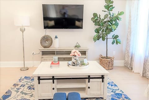 HDTV in the living room as you walk in to the home, spread out on the comfy couches and enjoy your favorite shows or watch a movie!