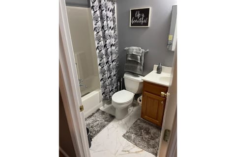 Combined shower/tub