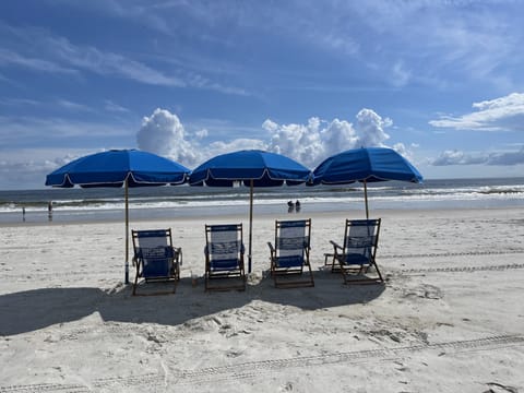 On the beach, beach towels