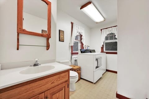 Combined shower/tub, hair dryer, towels, soap