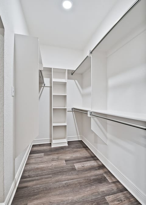 Closet in Main Bedroom that connects to laundry room