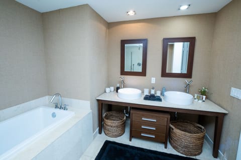 Bathtub, jetted tub, hair dryer, towels