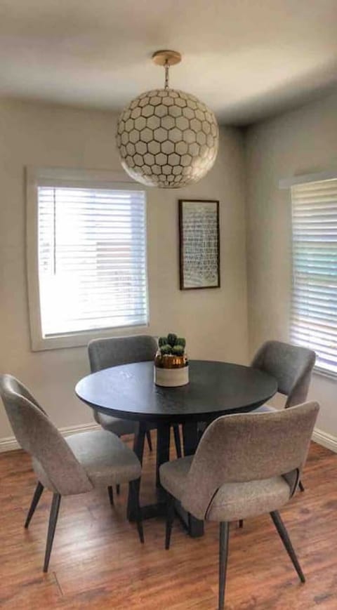 Dinning table with four chairs.