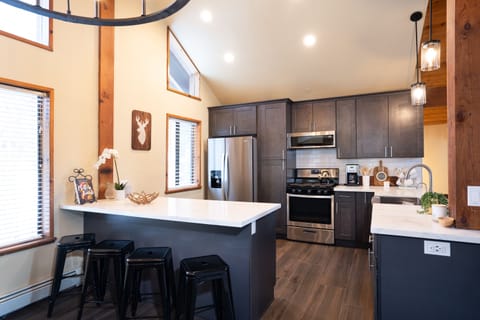 New stainless steel refrigerator, microwave, stove/oven, sink and dishwasher