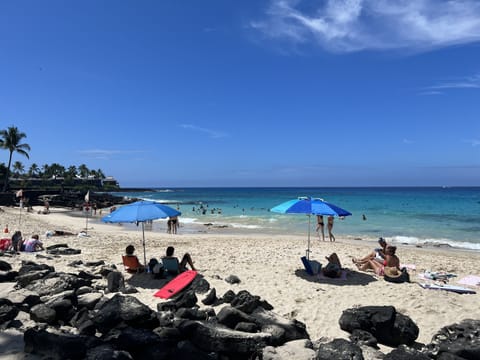 On the beach, sun loungers, beach towels