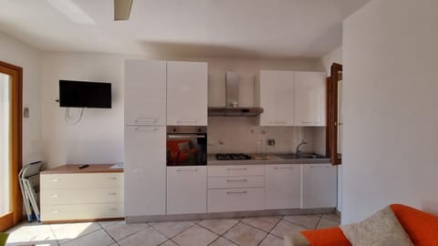 Fridge, oven, dishwasher, dining tables