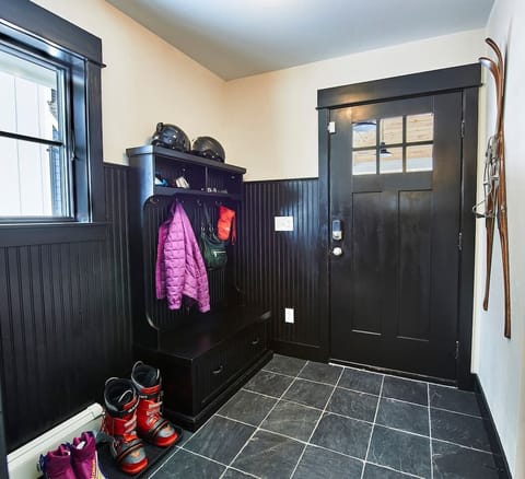 Upon entry into the house from the back entrance is the mud room where you can hang your coat, hat, bag, etc.