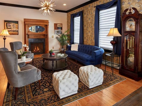 Sit by the gas fireplace and relax. The mantel dates back to the 1880s. 