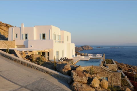 An infinity pool, sun loungers