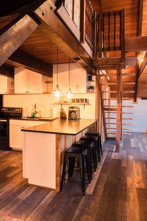 The kitchen counter and barstool seating.