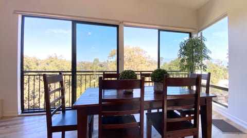 Dining area with mountain side view.