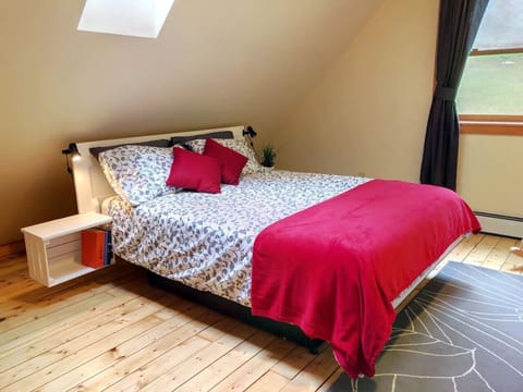 Second floor bedroom  with queen size bed and ensuite