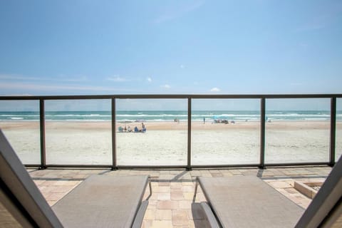 On the beach, sun loungers, beach towels