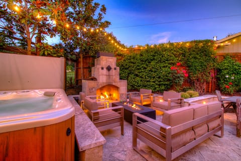 Relax with a modern 8-person hot tub or by the fire