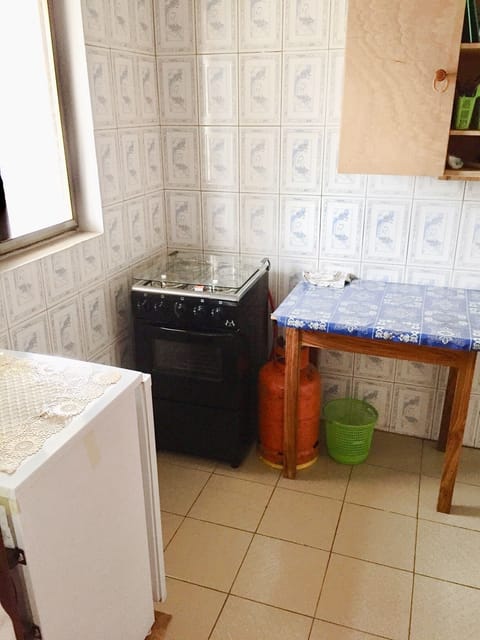 Fridge, oven, electric kettle, cookware/dishes/utensils