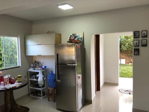 Fridge, stovetop, dining tables