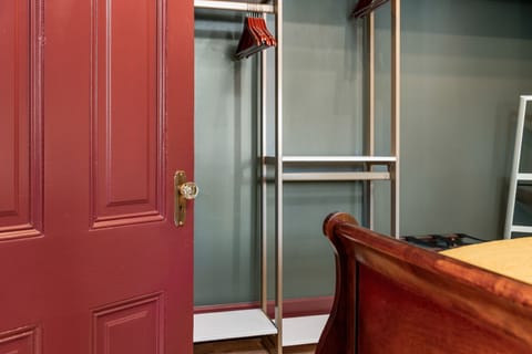 Wardrobe in bedroom closet is adjustable for storage needs