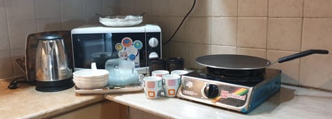 Fridge, microwave, stovetop, electric kettle