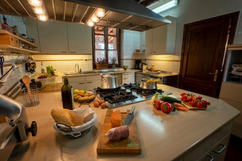 Countertop, Cabinetry, Kitchen, Wood, Interior Design, Kitchen Appliance, Kitchen Stove, Floor, Flooring, Food