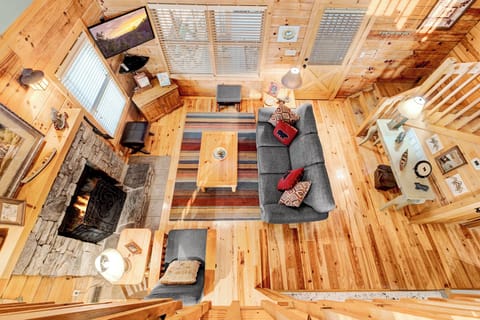 Bedroom 3 overlooks all of the action downstairs living room, like a clubhouse watch tower! It's no wonder why kids LOVE sleeping in the loft!