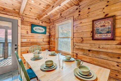 Enjoy your meals on our 10-seat dining table with a built in and pull-out benches. Our new hickory and alder wood dining table is not shown.