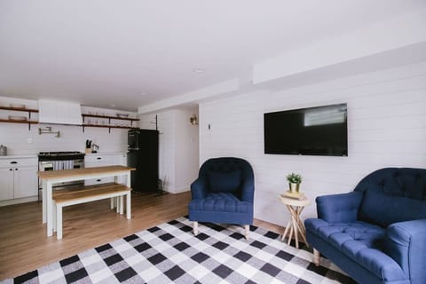 Spacious living room, dining area and fully stocked kitchen.