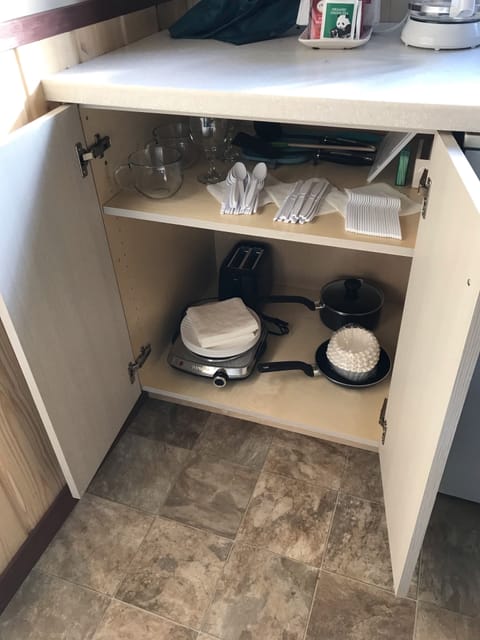 Microwave, coffee/tea maker, toaster, cookware/dishes/utensils