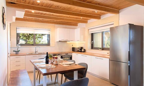 Kitchen area. Orientem Villa | HotelPraxis Group