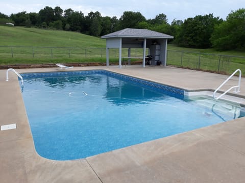 Large pool with covered hut. Weber grill with amenities. WiFi connected.