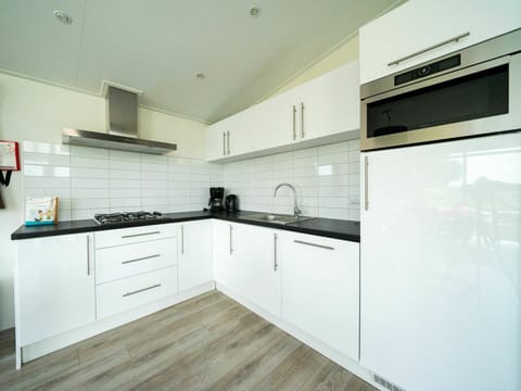 Cabinetry, Countertop, Tap, Sink, Property, Kitchen Sink, Building, Kitchen Stove, Kitchen Appliance, Kitchen