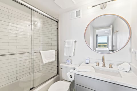 Combined shower/tub, hair dryer, towels, soap