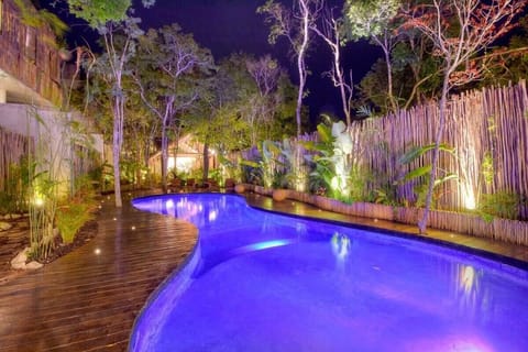 A rooftop pool, sun loungers