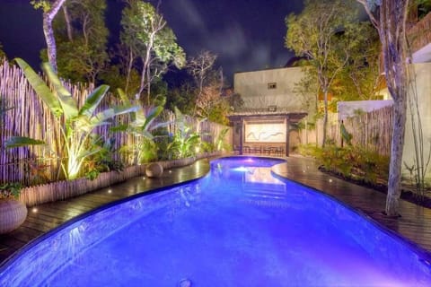 A rooftop pool, sun loungers