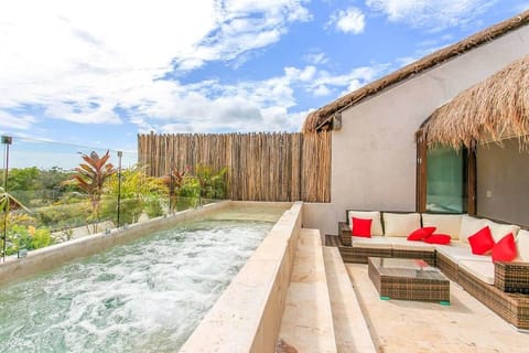 A rooftop pool, sun loungers