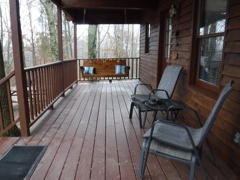 Relax on the Wooden Swing at Cabin 14