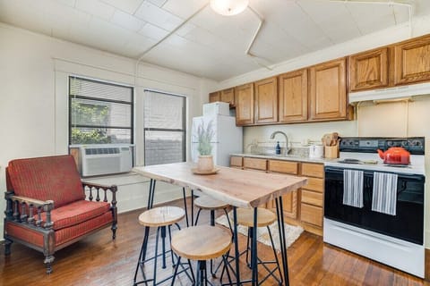 Our kitchen is complete with a 4-burner stove, oven, fridge, microwave, and everything you'll need to create your favorite dishes.