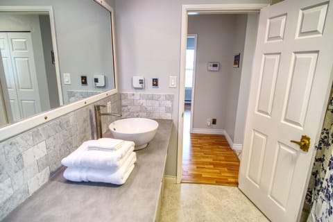 Combined shower/tub, hair dryer, towels, soap