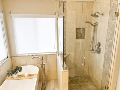 Master bath with soaking tub and double headed shower