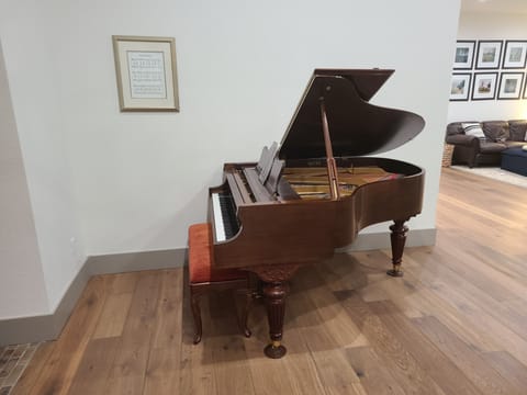 grand piano in the main living room